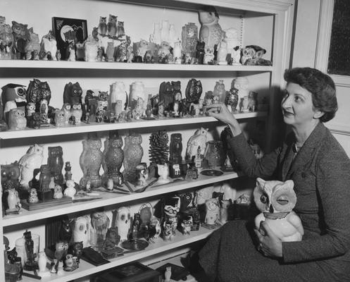 Seward, Doris, Dean of Women and Professor of Education, pictured with owl collection, from Public Relations Department