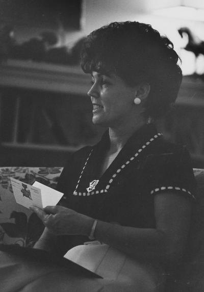 Singletary, Gloria, spouse of President Otis Singletary, pictured in the library at Maxwell Place, duplicate in general print file