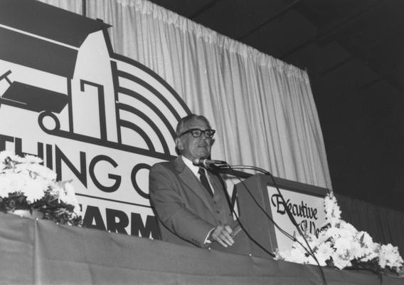 Singletary, Otis A., University of Kentucky President 1969-1987, pictured standing at a podium at the Executive West Farm-College of Agriculture