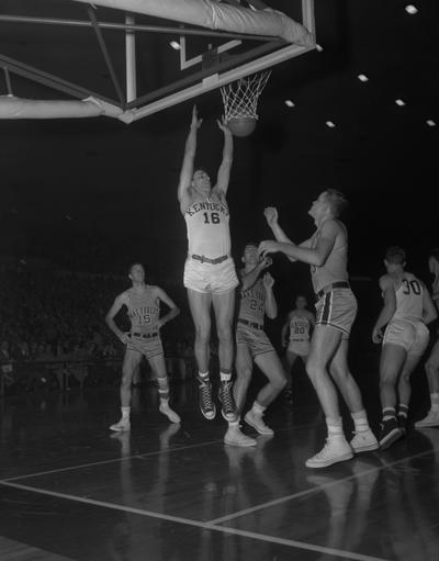 Tsioropoulos, Lou, All American University of Kentucky Basketball Player, pictured in game against Wake Forest as player # 16, graduated in 1953 in Education