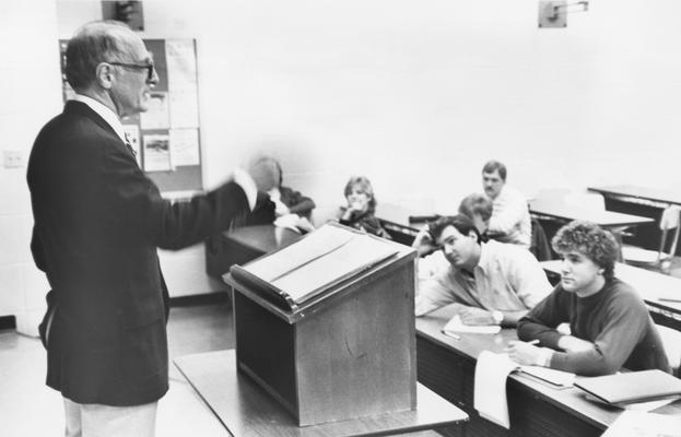 Ulmer, Sidney, pictured teaching class, photograph by Chuck Perry