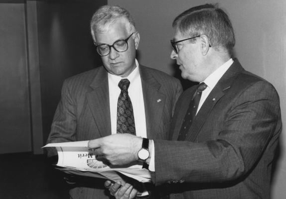 Willis, Paul A., Director of Library Department, pictured in Communi-K, pictured with Rex Bailey (right) from Central Development