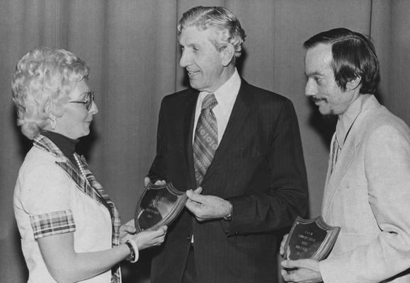 Witte, Ernest, pictured receiving an award from Suzanne Jett (left) with John Meyers (right)
