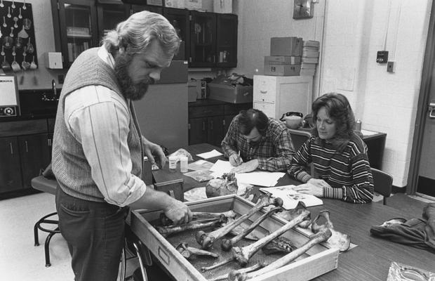 Wolf, David, pictured with students in Anthropogy Laboratory