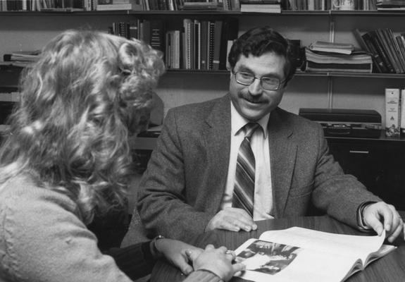 Baer, Michael Dr., Professor of Political Science pictured in office
