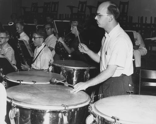 Longyear, Rey M., Musicologist, Professor, School of Music, 1964 - 1994, b. 1930 - d. 1995; pictured playing timpani with the Knoxville Symphony Orchestra, September 1964