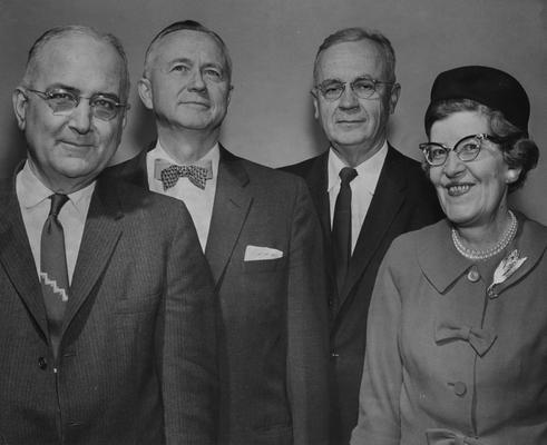 Carpenter, Cecil C., Professor, Economics, College of Commerce, photographer: Lexington Herald - Leader Staff, pictured with 3 unidentified people, photograph marked 