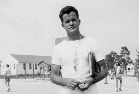 Clay, Maurice Alton, Professor, Physical Education, Coordinator, Undergraduate Professional Physical Education, 1940? - 1976, Alumnus, Ph. D., 1955, Executive Director of Omicron Delta Kappa national college leadership honor society, Former president of the UK Faculty Club, Board of Spindletop Hall, pictured on Army base with dogtags