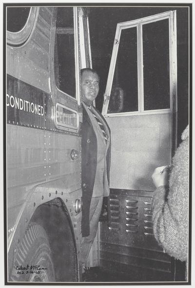 Louis Armstrong in his tour bus at the Phoenix Hotel