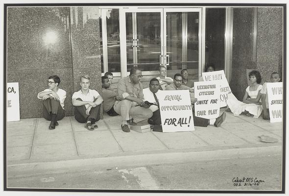 Congress on Racial Equality (CORE) sit-in in front of the old Lexington City Hall on Walnut Street, pictured are students from the Lexington Theological Seminary and leaders of the Lexington chapter of CORE, Julia Lewis and Ronald Berry