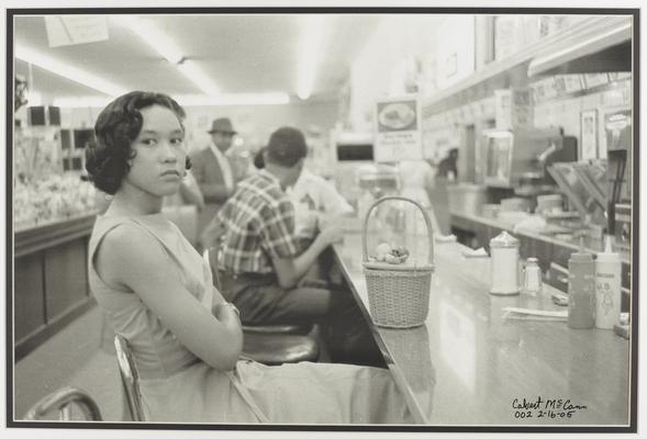 University of Kentucky student, Nieta Dunn, sitting in the all-white section at a dime store lunch counter