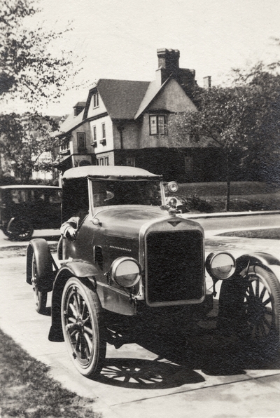 An image of Helen Cochran sitting in a Ford Model A, which they called 