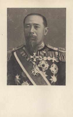 Portrait of an unidentified Japanese man in a medal-bedecked uniform
