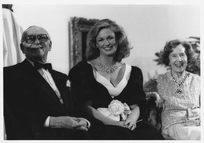 Arman Hammer, left, Phyllis George (center, spouse of Governor John Y. Brown, Jr.) and Mrs. Armand Hammer, right, at the opening of the Armand Hammer exhibit in the Art Museum at the Singletary Center