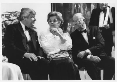 Governor John Y. Brown, Jr., left, Mrs. Bill Sturgill, center, and Mr. Bill Sturgill, right, at the opening of the Armand Hammer exhibit in the Art Museum at the Singletary Center