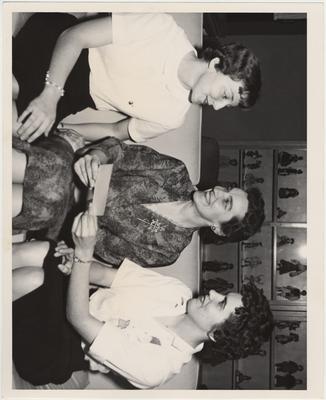 Abby Marlatt (center) with two unidentified women