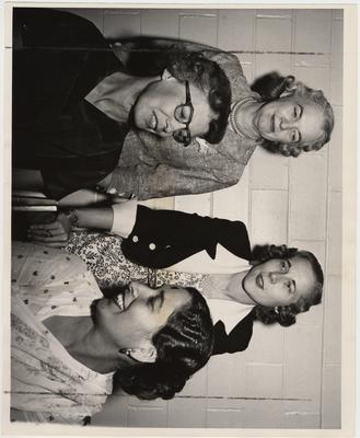 New University of Kentucky Home Economics professors in 1960; From left to right seated: Shirley Newsom and Robini Dashi; Standing: Catherine Kiss and Norma Perry