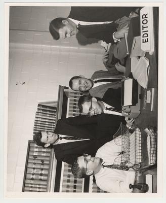Members of the Kentucky Law Journal; From left to right seated: James Park, Jr., Leslie Morris II, and Glen Green; Standing: Thomas P. Lewis, law professor, and Jesse Hall