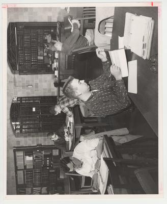 Students studying in the Law Library; From left to right: Carl Clontz, George Shadoan, Bill Priest, Ken Ragland, and Jim Prater (Prather?)