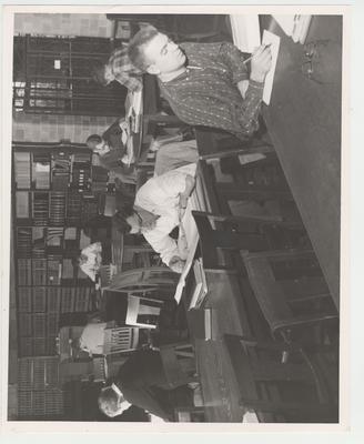 Students studying in the Law Library; From left to right: Carl Clontz, George Shadoan, Bill Priest, and Ken Ragland
