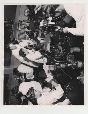 William H. Johnson and his students in the Pharmacy lab