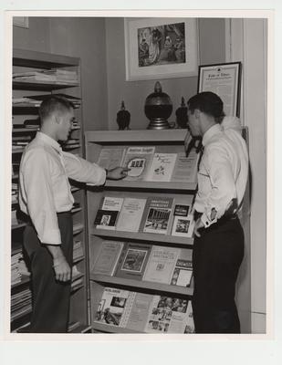Students examine journals in the Pharmacy Library
