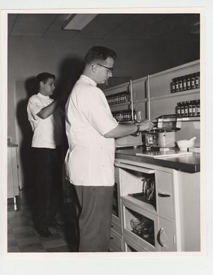 Men working in Pharmacy laboratory