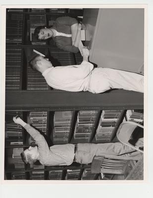 Students search for books at the Pharmacy Library