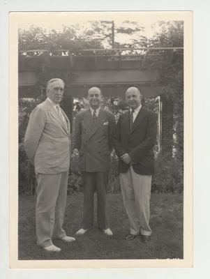 From left to right: President Frank L. McVey and Governor Keen Johnson with an unidentified man