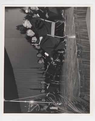 Distinguished commencement guests on stage