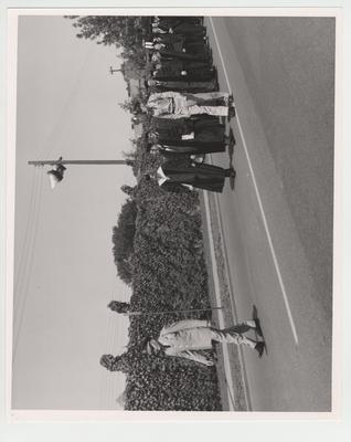 Commencement procession including Colonel William E. Grubbs, President Dickey, and speaker Theodore A. Distler of the Association of American Colleges, and other dignitaries