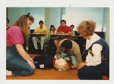 Students practice CPR