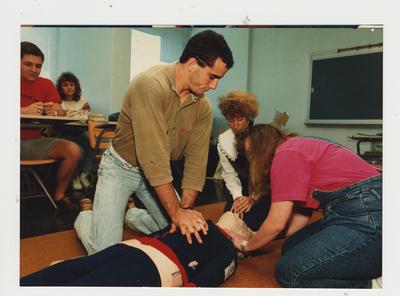 Students practice CPR