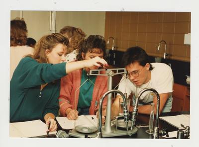 Students perform an experiment
