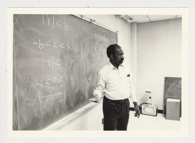 An African - American male professor teaches a Math class at Elizabethtown Community College