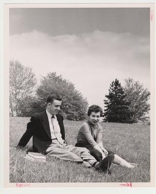 Devou Park; John Whitt and Billie Rose Lambert enjoy a beautiful day while seated in the grass