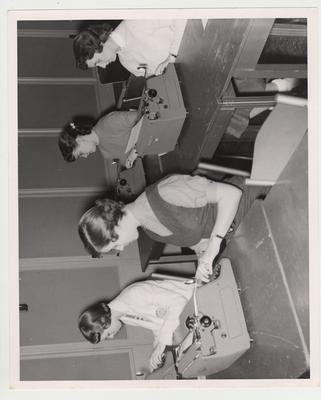 Women working at a typewriter