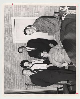 Members of the Student Activities Committee at the Northern Center; From left to right: H. J. Brewer, Betty Lou Hutchinson, Elaine Satchwell (seated), Thomas L. Hankins, and Don Reckner