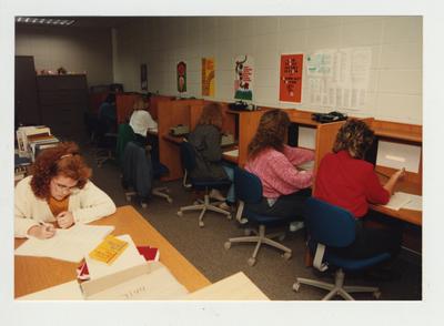 Female students study in the library
