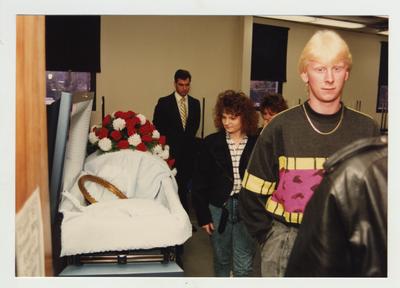 A group of people participate in a workshop on grief