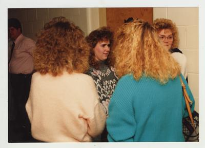 A group of people participate in a workshop on grief