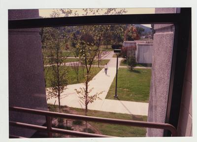 View of a male student walking on campus