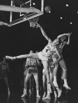 Basketball game action, UK versus Georgia; Ned Jennings (4) shoots at Memorial Coliseum