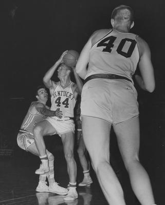 Basketball game action, UK versus North Carolina; Larry Conley (40) watches as Charles 