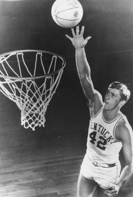 Basketball team member Pat Riley (1965-67) shooting the ball
