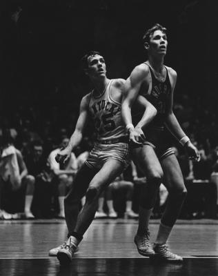 Basketball game action, UK versus Vanderbilt; Larry Steele (25) and opponent during game; photo appears on page in the 1969 Kentuckian