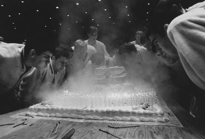 UK Athletic Board celebrates UK basketball's 1000th victory with a celebration cake; photo appears on page 89 in the 1969 Kentuckian
