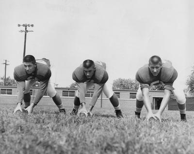 Three UK players, Art Janes, John Slack, and Jerry Shehan, pose during practice. Received June 13, 1959 from Cincinnati Enquirer