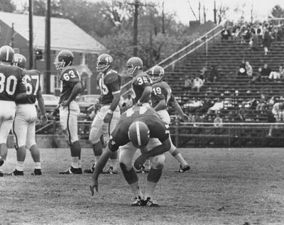 Unidentified UK football players doing pre-game warm-ups. Photo appears on page 218 in the 1969 Kentuckian