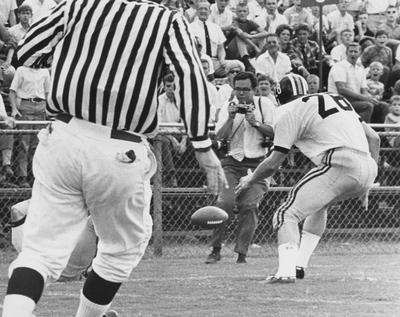 Unidentified UK football players during game against unidentified opponent. Photo appears on page 444 in the 1969 Kentuckian